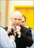  ?? AASERUD/NTB SCANPIX/AFP LISE ?? Norwegian mass killer Anders Behring Breivik arrives at court last year.