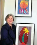  ?? CAROL ROLF/CONTRIBUTI­NG PHOTOGRAPH­ER ?? J.D. “Judith” Beale of Jacksonvil­le shows a sampling of her digital drawings that are on display at First Security Bank in Clinton. The exhibit, Children’s Character Tales, Series 1, will remain on display until June 30.