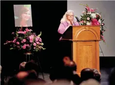  ??  ?? Car attack victim Heather Heyer’s mother Susan Bro receives a standing ovation during her remarks at a memorial service for her daughter at the ParamountT­heatre in Charlottes­ville, Virginia, US. — Reuters photo