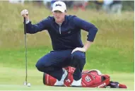  ?? IAN RUTHERFORD / USA TODAY SPORTS ?? Mequon native Jordan Niebrugge lines up a putt at the 2015 British Open in St. Andrews, where he finished tied for sixth.