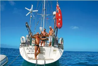  ?? PHOTO: SUPPLIED ?? Peter McLean (left) aboard Jungle, the yacht that struck a reef in the Pacific Ocean.