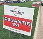  ?? THOMAS BEAUMONT/AP ?? Signs promoting Florida Gov. Ron DeSantis in 2024, financed by the super PAC backing DeSantis, line a street in Sioux Center, Iowa, on May 13.