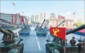  ?? KNS/KCNA/AFP ?? Tanks roll down the road during a mass military parade at Kim Il-sung Square in Pyongyang on October 10.