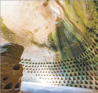  ?? Suprunvita­ly Getty Images ?? A VISIT to Beit Guvrin National Park in Israel brought out a brave spirit. This cave has niches for doves.