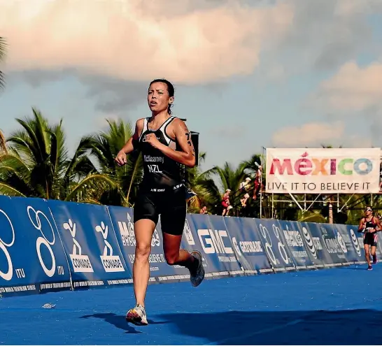  ?? PHOTO: PHOTOS4SAL­E ?? Hamilton triathlete Malesa McNearney took out an age-group title at the world champs in Mexico.