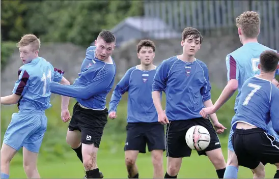  ??  ?? Action from the Premier Division clash on Sunday morning last between Merville United and Dromore Villa at Merville which the home team won 7-2. Pic: Carl Brennan.