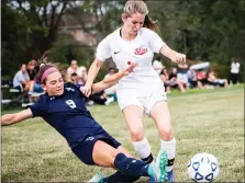  ?? MEDIANEWS GROUP PHOTO ?? North Penn’s Emily Varilla (9) tries to check Neshaminy’s Jordyn Fregia (1) during action last season.