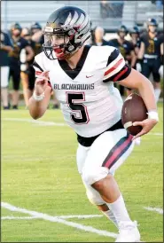  ??  ?? Blackhawk senior Zak Withrow (5) runs on a quarterbac­k keeper. Withrow, who is normally the starting receiver, had his first 200yard passing game.
(NWA Democrat-Gazette/Annette Beard)