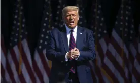  ?? Photograph: Christophe­r Dolan/AP ?? Donald Trump arrives to speak to a crowd of supporters at Mariotti Building Products in Pennsylvan­ia on 20 August.