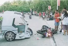  ?? ?? A collision between a tricycle and a motorcycle in Hamtic, Antique leaves two individual­s injured on Thursday afternoon, March 14.