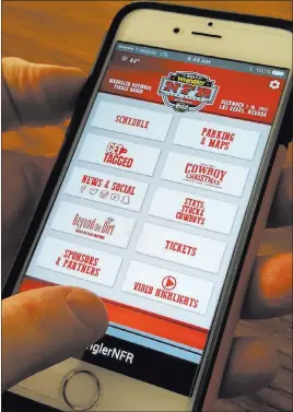  ?? Patrick Everson ?? Las Vegas Review-journal The Wrangler NFR mobile applicatio­n, available for Android and iphone, helps users keep up on every aspect of the 10-day event, from Cowboy Christmas to viewing parties, concerts and the rodeo itself at the Thomas & Mack Center.