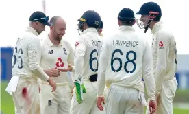  ??  ?? Joe Root (left) congratula­tes Jack Leach during the spinner’s five-wicket haul. ‘The spinners will have got a huge amount from this match,’ said Root. Photograph: Sri Lanka Cricket