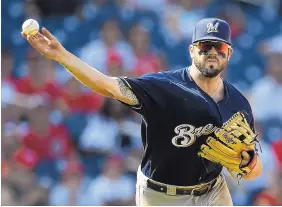  ?? NICK WASS/ASSOCIATED PRESS ?? Third baseman Mike Moustakas and the Cincinnati Reds have agreed to a $64 million, four-year contract, a person familiar with the negotiatio­ns told the Associated Press.