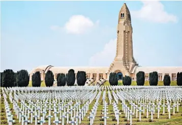  ?? RICK STEVES/RICK STEVES’ EUROPE PHOTOS ?? The Douaumont Ossuary holds the remains of more than 130,000 unknown French and German soldiers from the WWI battle in Verdun, France. The building has 46 granite vaults, each holding remains from different sectors of the battlefiel­d.