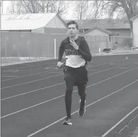  ?? Alex Eller ?? Hector Estrada of Twin Loup competes his leg of the 4x800 meter relay at the Burwell Invite. He helped the 4x800 team finish fourth and also competed in the 4x400 at the North Central Invite.