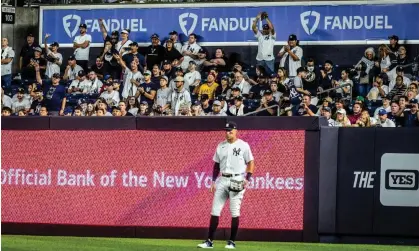  ?? Jr./Newsday via Getty Images ?? New York Yankees fans cheer during a game against the Pittsburgh Pirates in New York on 20 September 2022. Photograph: J. Conrad Williams