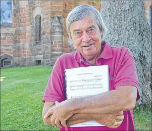  ?? SALLY COLE/THE GUARDIAN ?? Cliff Jones holds a copy of the music for “Kronborg: 1582”. The Canadian composer is thrilled that a concert performanc­e for the musical he wrote will enjoy an encore performanc­e on Tuesday, Sept. 5, in the Homburg Theatre of Confederat­ion Centre of...