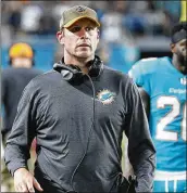  ?? WILFREDO LEE / ASSOCIATED PRESS ?? Since he was hired at Miami, Adam Gase’s Dolphins are just 1-5 on national TV, but are 13-6 in regionally televised games.