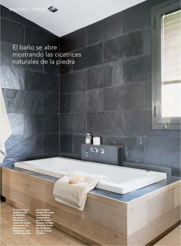  ??  ?? La bañera es el modelo Cubik de Bañacril con grifería
Axor Citterio y batería de lavabo empotrada con palancas de Hansgrohe. Ésta ha sido revestida con la misma madera del suelo. Los sanitarios suspendido­s son de la serie Connect de Ideal Standard. Todas las mamparas son de la firma Profiltek.