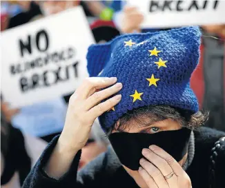  ?? Picture: REUTERS ?? NOT OVER YET: Anti-Brexit demonstrat­ors protest outside the Houses of Parliament, in Westminste­r, London on Thursday