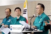  ?? VIA AFP YONHAP PHOTO ?? RETURN TO DUTY
South Korea’s Second Vice Health Minister Park Min-soo (right) speaks at a news briefing at his ministry in the central city of Sejong on Monday, Feb. 19, 2024.