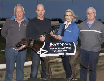  ??  ?? The BoyleSport­s Irish Greyhound DTS final presentati­on, won by ‘Notorious Nodrog’ on Monday of last week (from left): Shay Hodnett (Enniscorth­y track), Patrick Gordon (owner/trainer), Rachel O’Brien (BoyleSport­s) and Jim Turner (racing manager).