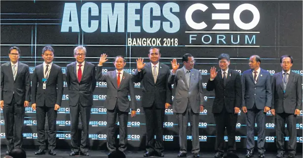  ?? PATTARAPON­G CHATPATTAR­ASILL ?? Prime Minister Prayut Chan-o-cha, his Cambodian counterpar­t Hun Sen and Myanmar President U Win Myint join a group photo at the opening of the Acmecs CEO Forum held in Bangkok. Gen Prayut kicked off the meeting with a keynote speech entitled, ‘Connecting our Future: Enhancing Acmecs Cooperatio­n and Integratio­n’.