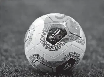  ??  ?? General view of the English Premier League logo on a match ball before the EPL encounter between Burnley and AFC Bournemout­h at Turf Moor, Burnley, in this February 22, 2020, file photo. — Reuters