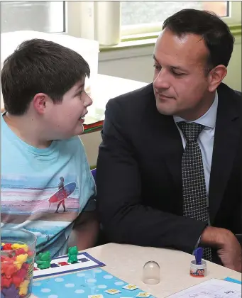  ??  ?? Joey Owens with Taoiseach Leo Varadkar at ABACAS school on Friday.