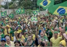  ?? SERGIO LIMA/AGENCE FRANCE-PRESSE ?? SUPPORTERS of Brazilian President Jair Bolsonaro take part in a demonstrat­ion against the results of the runoff election, in front of the Army headquarte­rs in Brasilia.