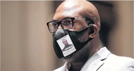  ?? GRAEME JENNINGS POOL VIA REUTERS ?? Philonise Floyd, brother of George Floyd, looks on during the opening statements at a House Judiciary Committee hearing on “Policing Practices and Law Enforcemen­t Accountabi­lity” on Capitol Hill in Washington, DC, on Wednesday.
•