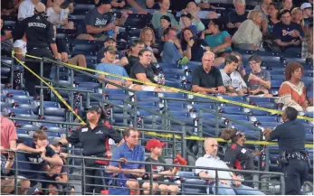 ?? JASON GETZ, USA TODAY SPORTS ?? Security ropes off an area where fan Greg Murrey fell from the upper deck at Turner Field in Atlanta on Aug. 29, 2105. Murrey died after the fall, and his family is suing the Braves and MLB.