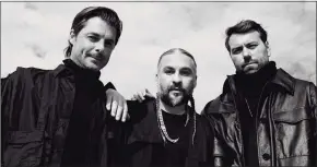  ?? Associated Press ?? DJ supergroup Swedish House Mafia, featuring, from left, Axwell, Steve Angello and Sebastian Ingrosso, are back with a new collab with The Weeknd and a world tour on the horizon.