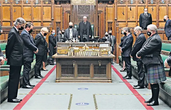  ??  ?? Members of the House of Commons stood as a mark of respect for the Duke of Edinburgh. Below, Boris Johnson and Sir Keir Starmer gave warm tributes to the Duke