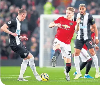  ??  ?? Scott Mctominay in Boxing Day action against Newcastle United, before his injury