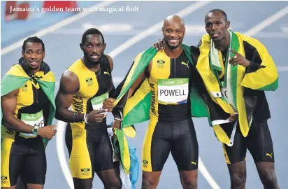  ??  ?? Jamaica’s golden team with magical Bolt