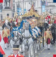  ?? PHOTO: PA. ?? The Coronation Procession on The Mall.