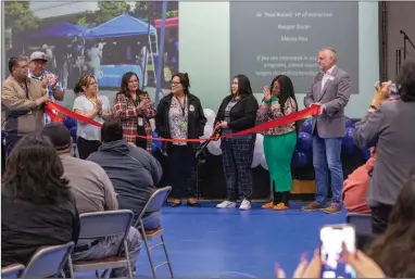  ?? PHOTOS COURTESY OF PORTERVILL­E COLLEGE ?? Dignitarie­s participat­e in a ribbon cutting ceremony launching a partnershi­p between Portervill­e College and the Tule River Tribe on Wednesday at the Tule River Indian Reservatio­n Gym.