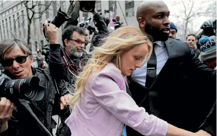  ?? PHOTOS: AP ?? Porn actress Stormy Daniels arrives at federal court in New York for a hearing where a federal judge considered how to review material the FBI seized from US President Donald Trump’s personal lawyer Michael Cohen in a raid on his office last week.