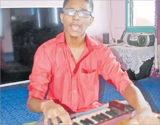  ?? Picture: ATU RASEA ?? Vimal Deo, 18, a student of Bhawani Dayal Arya College of Nausori, sings bhajan at his home in Koronivia.