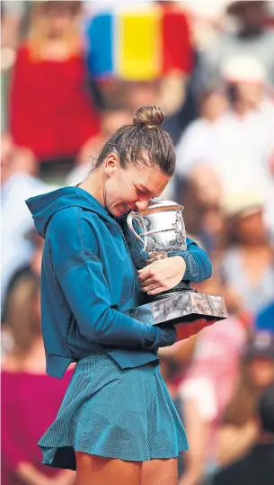  ?? CLIVE BRUNSKILL/GETTY IMAGES ?? “I was dreaming for this moment since I started to play tennis,” Simona Halep said after her win.