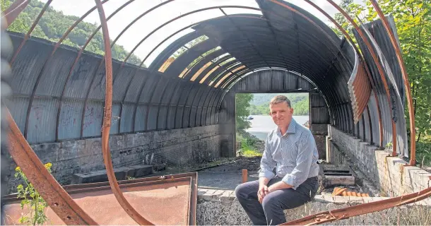  ??  ?? VISION: Stephen Connelly by the derelict boathouse near the proposed landing area of a zip-wire project that has led to claims of ‘personal attacks’ in Kinlochlev­en