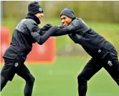  ?? AFP ?? Manchester United’s Jesse Lingard (left) and Marcus Rashford at the club’s training complex near Carrington, on Monday, eve of their Champions League round of 16 second leg match against Sevilla. —