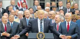  ?? REUTERS ?? Donald Trump with Congressio­nal Republican­s in the Rose Garden of the White House.