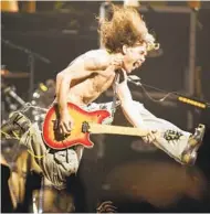  ?? JOHN MUNSON AP FILE ?? Eddie Van Halen, shown in 2004, propelled his band Van Halen into one of hard rock’s biggest groups.