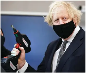 ??  ?? Powering on: Boris Johnson visiting BAE Systems in Lancashire yesterday
