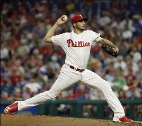  ?? THE ASSOCIATED PRESS ?? Phillies starter Zach Eflin delivers during the third inning Monday. Eflin didn’t help his cause with a costly throwing error in another Phillies loss, 5-3 to the Nationals.