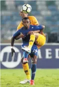  ?? Picture: Anesh Debiky/Gallo Images ?? Mario Booysens of Chiefs tackles Tojo Claudel Fanomezana of Elgeco Plus.
