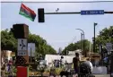  ?? FOTO: CARLOS GONZALEZ/TT-AP ?? George Floyd Square i Minneapoli­s öppnar återigen för trafik efter att ha varit avstängd i över ett år.