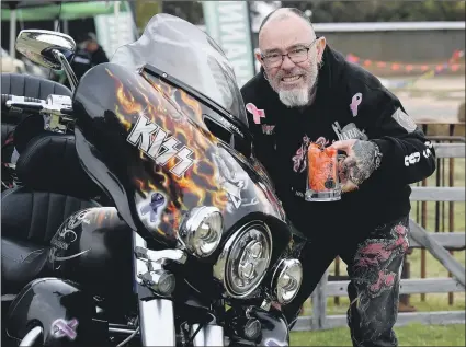  ?? Picture: PAUL CARRACHER ?? ON THE ROAD: Coleraine’s Darren Knape shows off his 2020 CVO Kiss-themed bike at a Harley Davidson Victorian State Rally at Horsham showground.